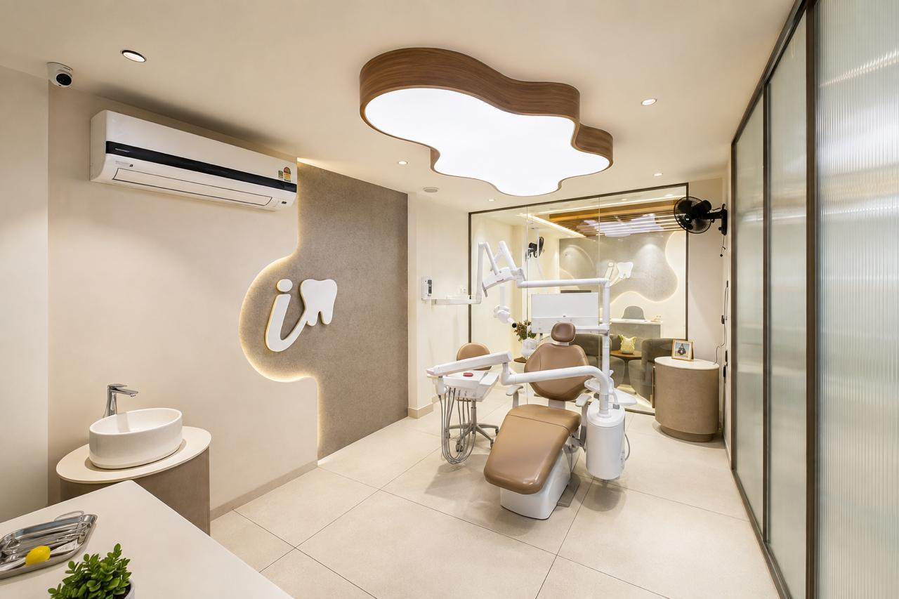 iDental treatment suite with a dental chair and warmly lit interiors